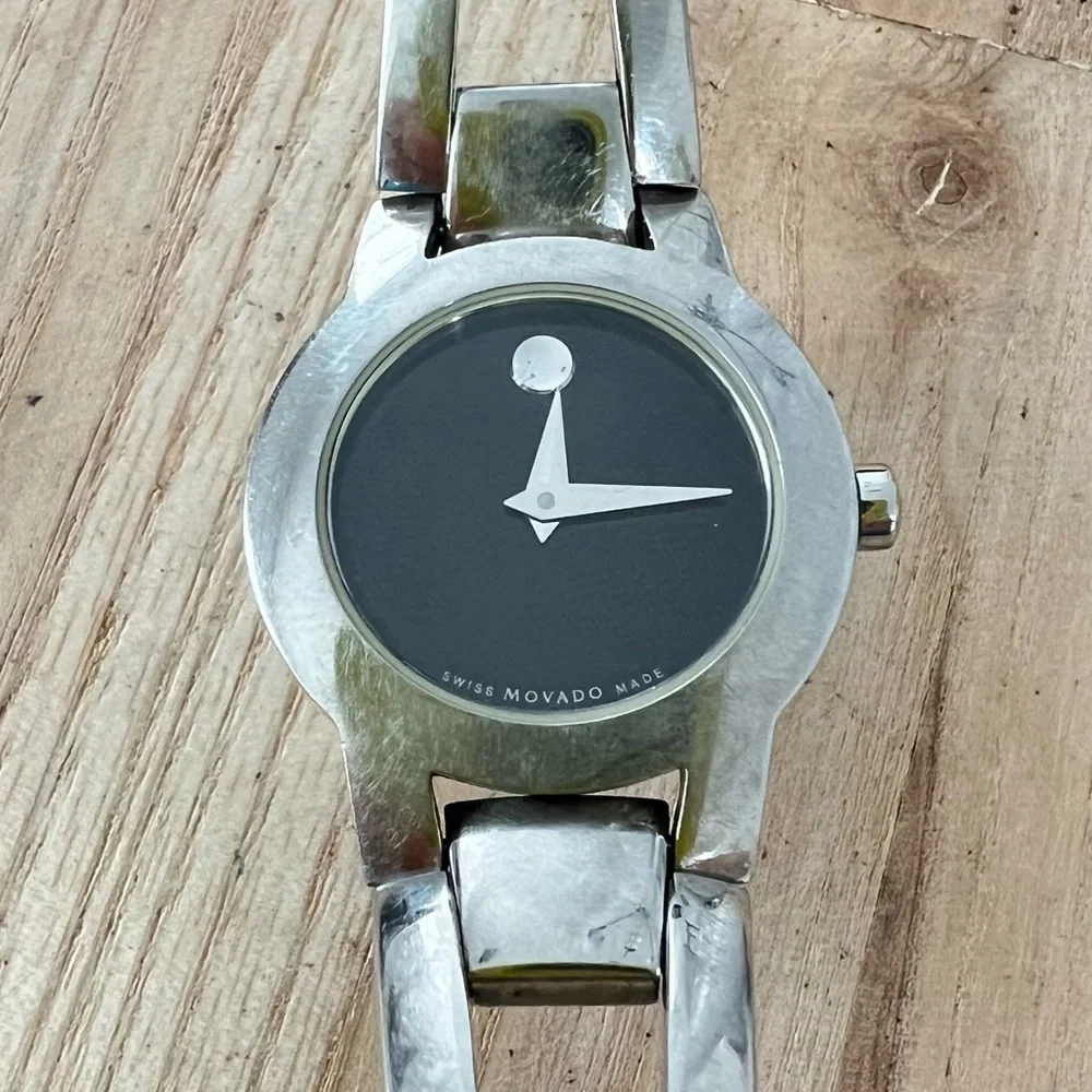 Movado Swiss Made ladies black dial stainless steel minimalist watch NEW BATTERY